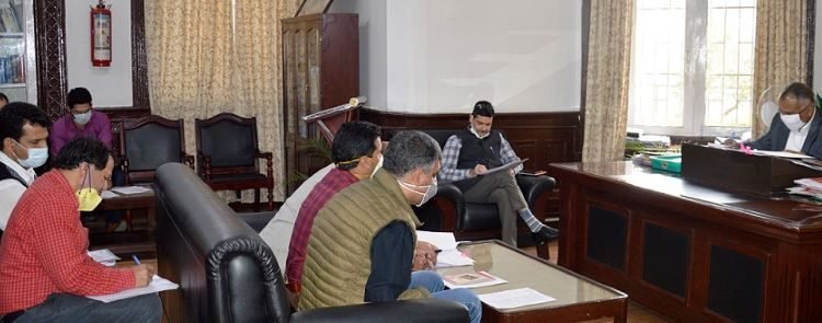 Div Com Reviews Progress of Work on Power Transmission Lines