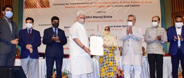 Lt Governor hands over Individual and Community Forest Rights certificates to members of Tribal Communities