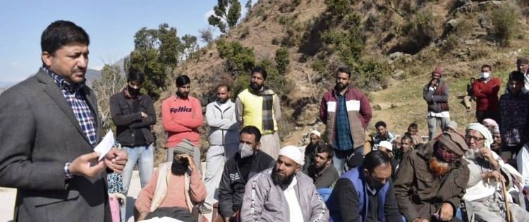 DDC Chairman Rajouri listens to peoples' issues at village Kangergali of block Darhal