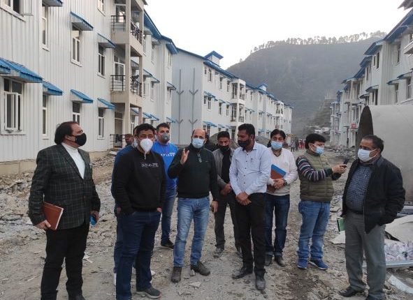 DC Ramban inspects progress of work on Yatri Niwas at Chanderkote
