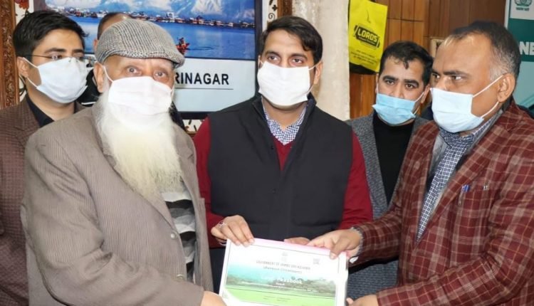 Div Com Kashmir, DC Srinagar hand over Land Passbooks to land owners