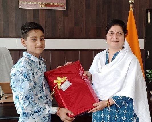 DC Reasi Babila Rakwal felicitates budding Artist Parmbeer Singh