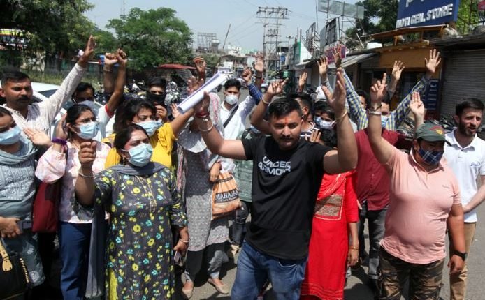 NHM contractual employees hold protest and demand continuation of services