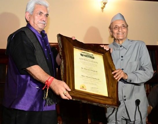 Lt Governor Manoj Sinha felicitates Dr. Karan Singh