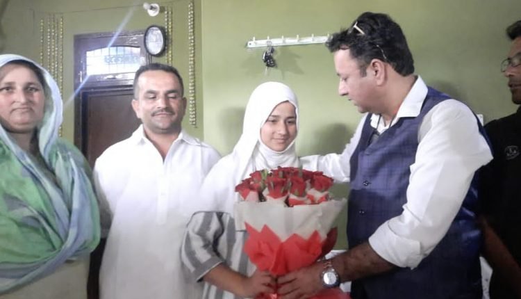 Choudhary Zulfikar Ali visits Hiranagar to congratulate Summara Shakeel for securing 99.2% marks in 10th class exams
