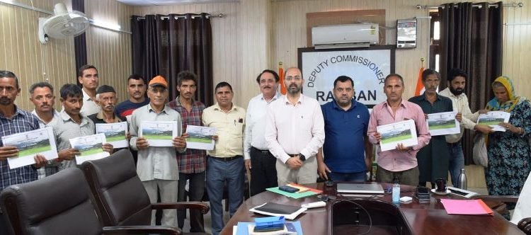 Land Passbook distribution functions held across Jammu division districts