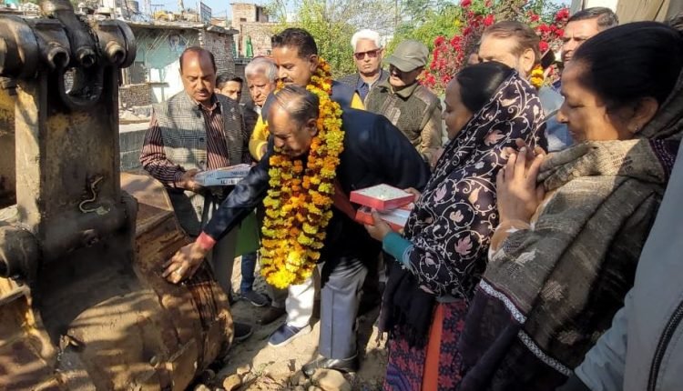 Construction work of Rajeev Nagar nallah at Kalika colony started by Sham Lal Basson Corporator