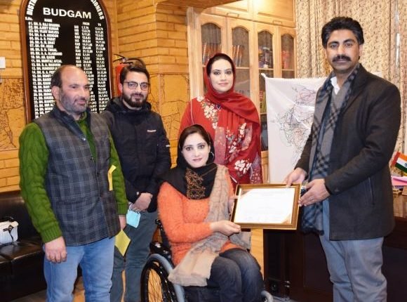 Dist Admin Budgam felicitates Insha Bashir, International Wheelchair Basketball player