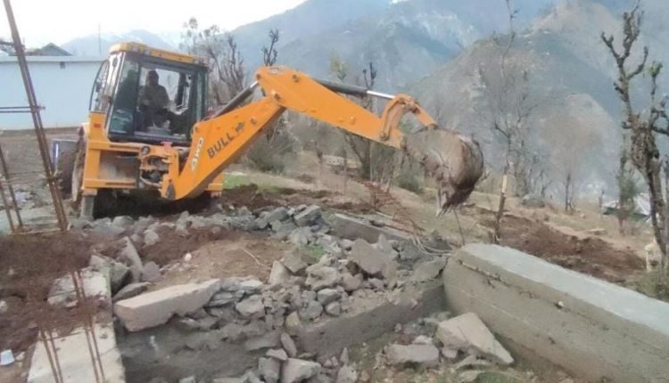 Ramban Administration retrieves 1137 Kanal state land, demolished illegal structures  