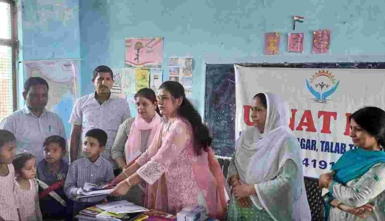 UNNAT distributes copies, pencils among Poor students