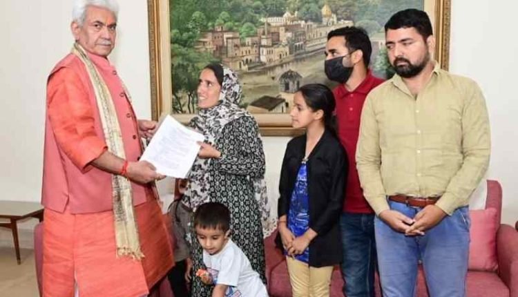 Lt Governor hands over appointment letter to martyr civilian Sanjay Sharma’s wife