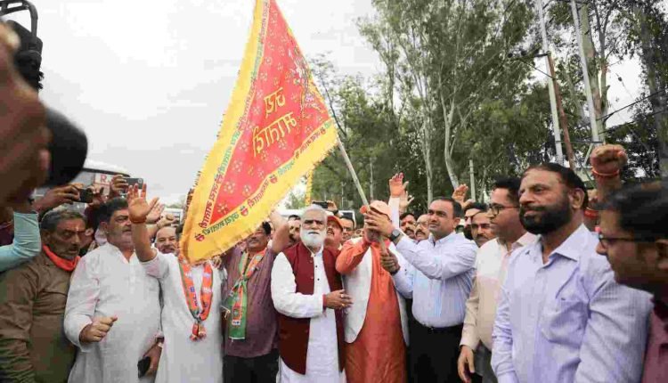 Div Com flags off devotees to Kheer Bhawani Mela from Nagrota Jammu