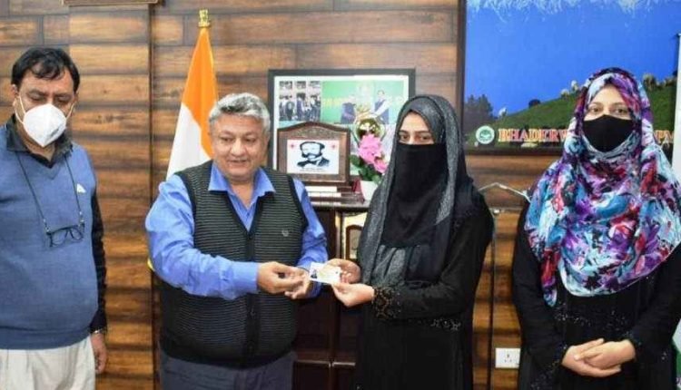 DC Doda distributes election cards among newly enrolled voters