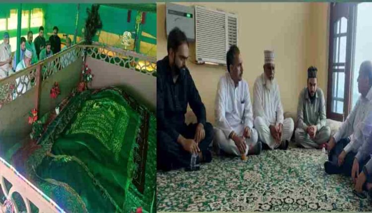 NC pays floral tributes to Late Sufi Saint Syed Muzzafar Hussain Shah Sahab (Baji Sahab) of Bravhi Kalakote.