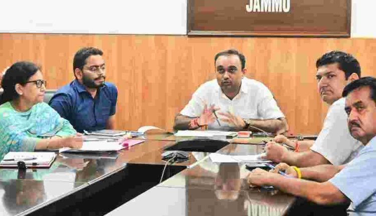 Div Com reviews implementation of Social Welfare Schemes in districts