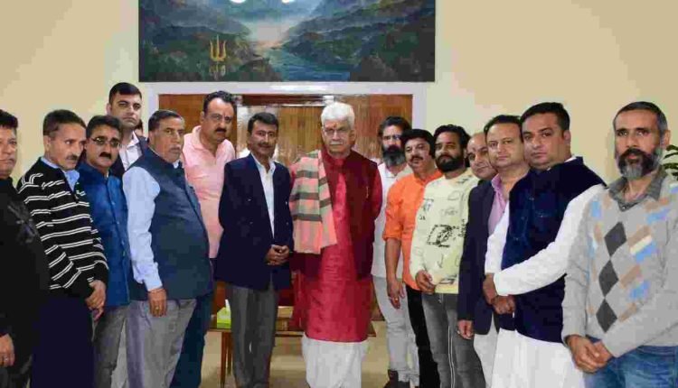 Members of Jagti Joint Action Committee, All Minority Employees Association Kashmir call on Lt Governor