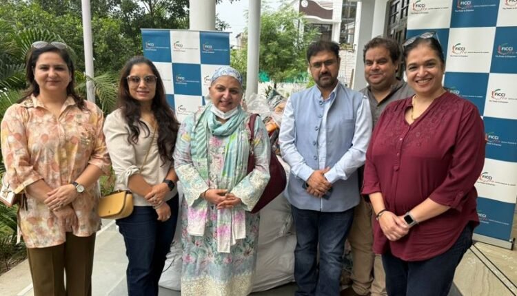 FICCI FLO JKL distributes flood relief material under Phase-3 in Jammu