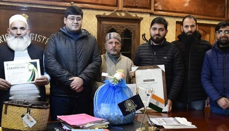 DC felicitates Willow Wicker craftsmen for bringing laurels to Ganderbal