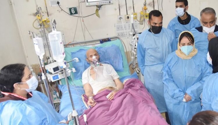 Health Minister visits ailing father of MP Er. Rashid at SMHS Hospital