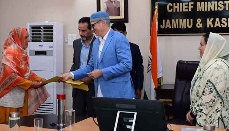 CM Omar Abdullah hands over regularisation orders to CPWs of School Education Department
